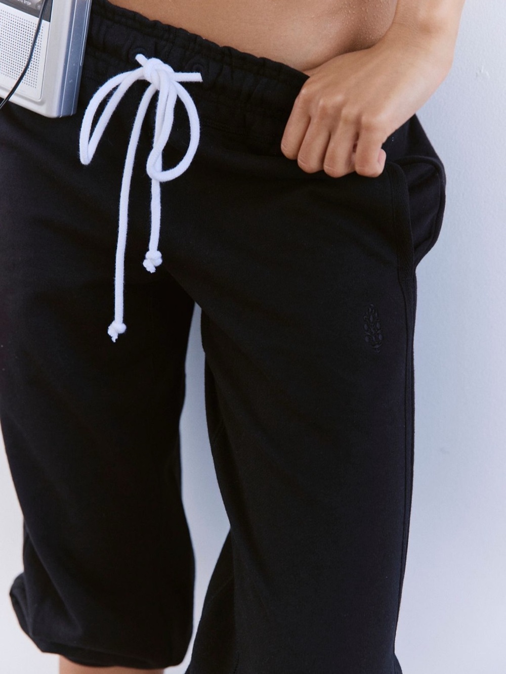 Flutter cropped joggers Free People Black Drawstring Sweatshorts with White Tie